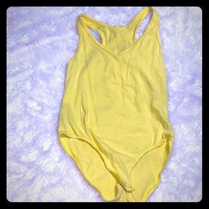 Yellow body suit